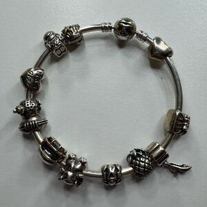 Pandora bangle Bracelet with several charms